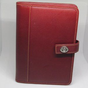 Coach red leather turnlock 4" x 6" photo album with white perimeter stitching